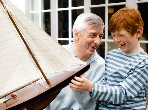 Close view of a man and his son laughing